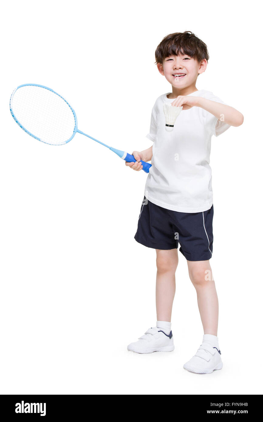 Cute boy playing badminton Stock Photo - Alamy