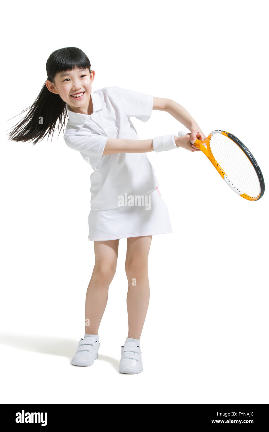 Cute girl playing tennis Stock Photo - Alamy