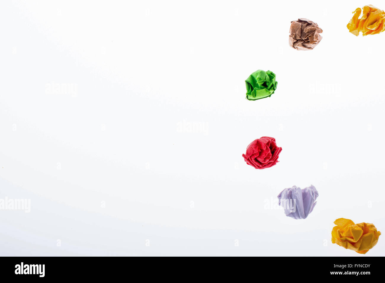Half Rounded Paper Colorful crumpled papers form a half round shape on white background ...