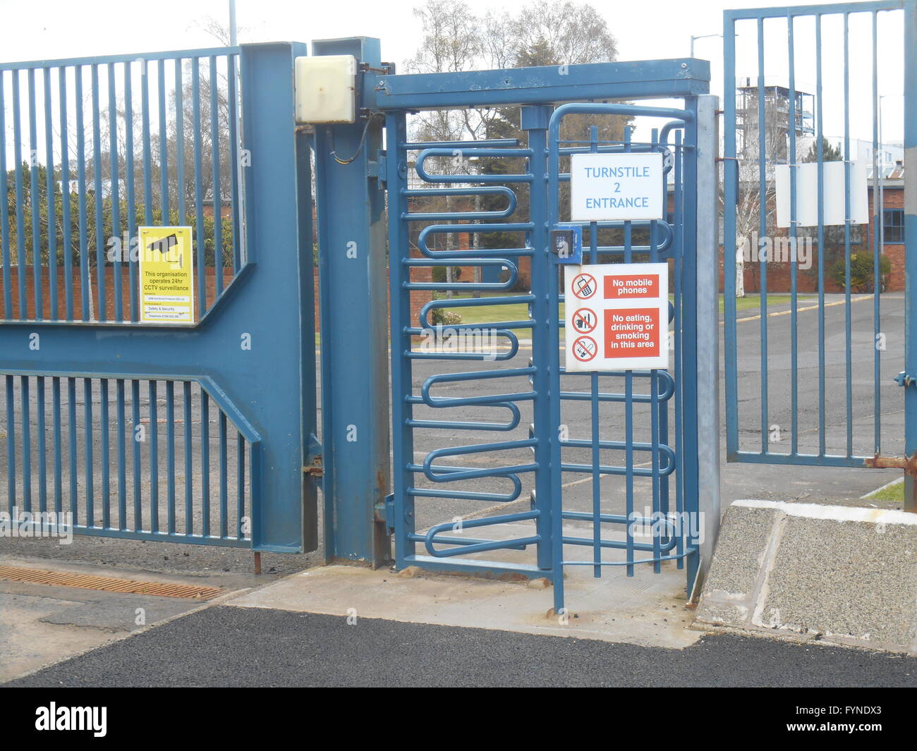 Turnstiles at local factory. Stock Photo