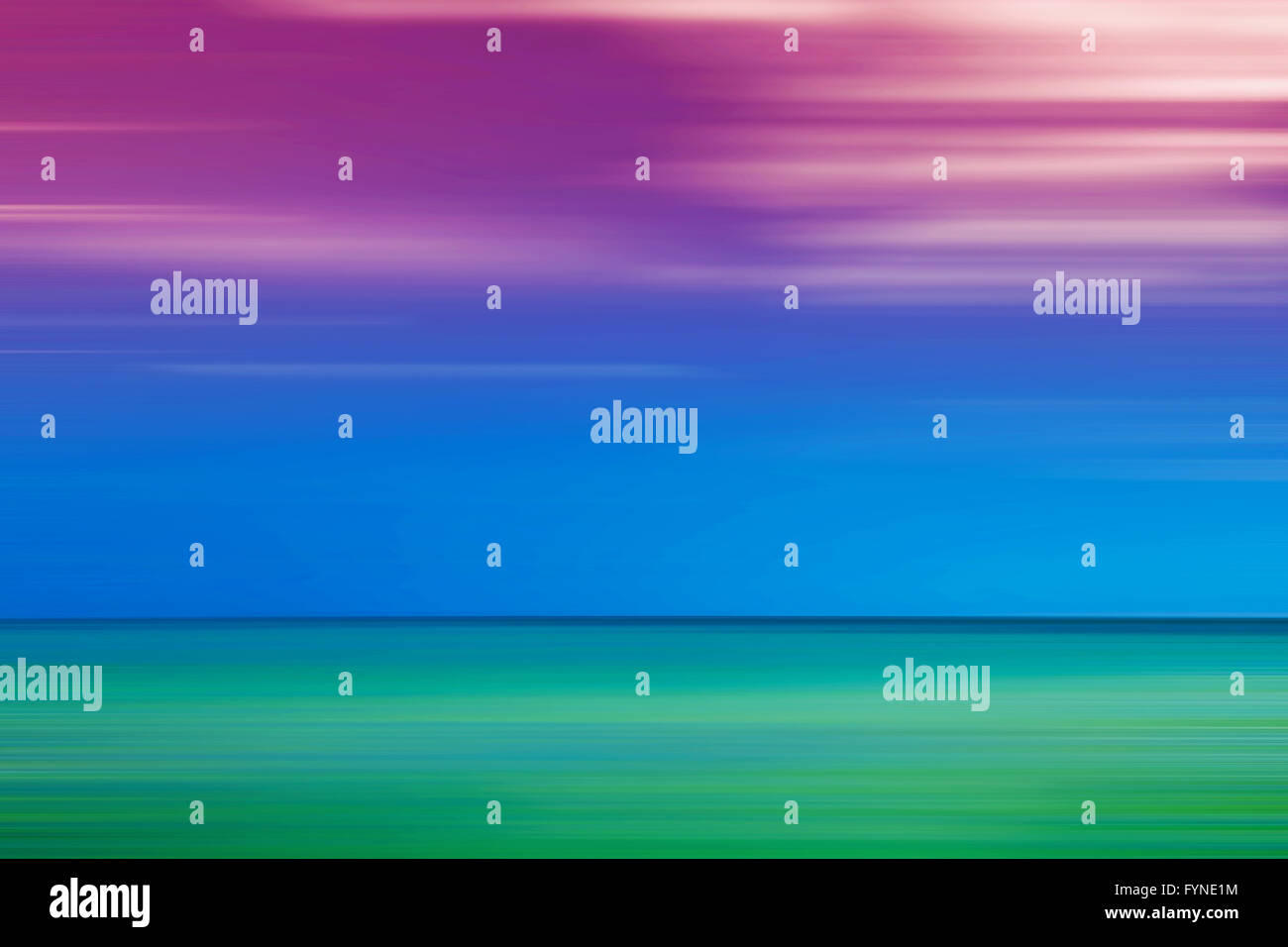 Blurred sea horizon. One third of the image is green, one third is blue and one third is purple. Stock Photo