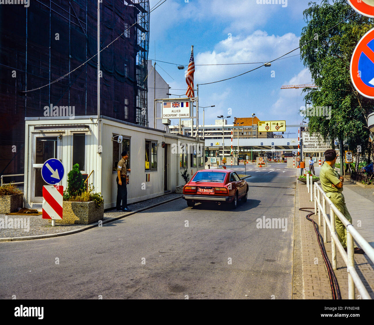 August 1986, Allied Checkpoint Charlie, British military police officer, red car, Friedrichstrasse street, Kreuzberg, West Berlin, Germany, Europe, Stock Photo