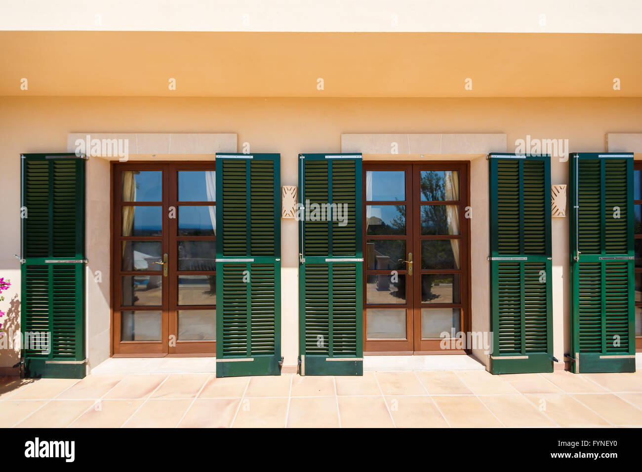 The Glass Doors Of The Spanish Home Nearby The Mediterranean Sea