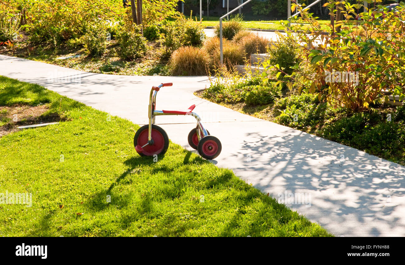 Tricycle and neighborhood park in Seattle Stock Photo Alamy