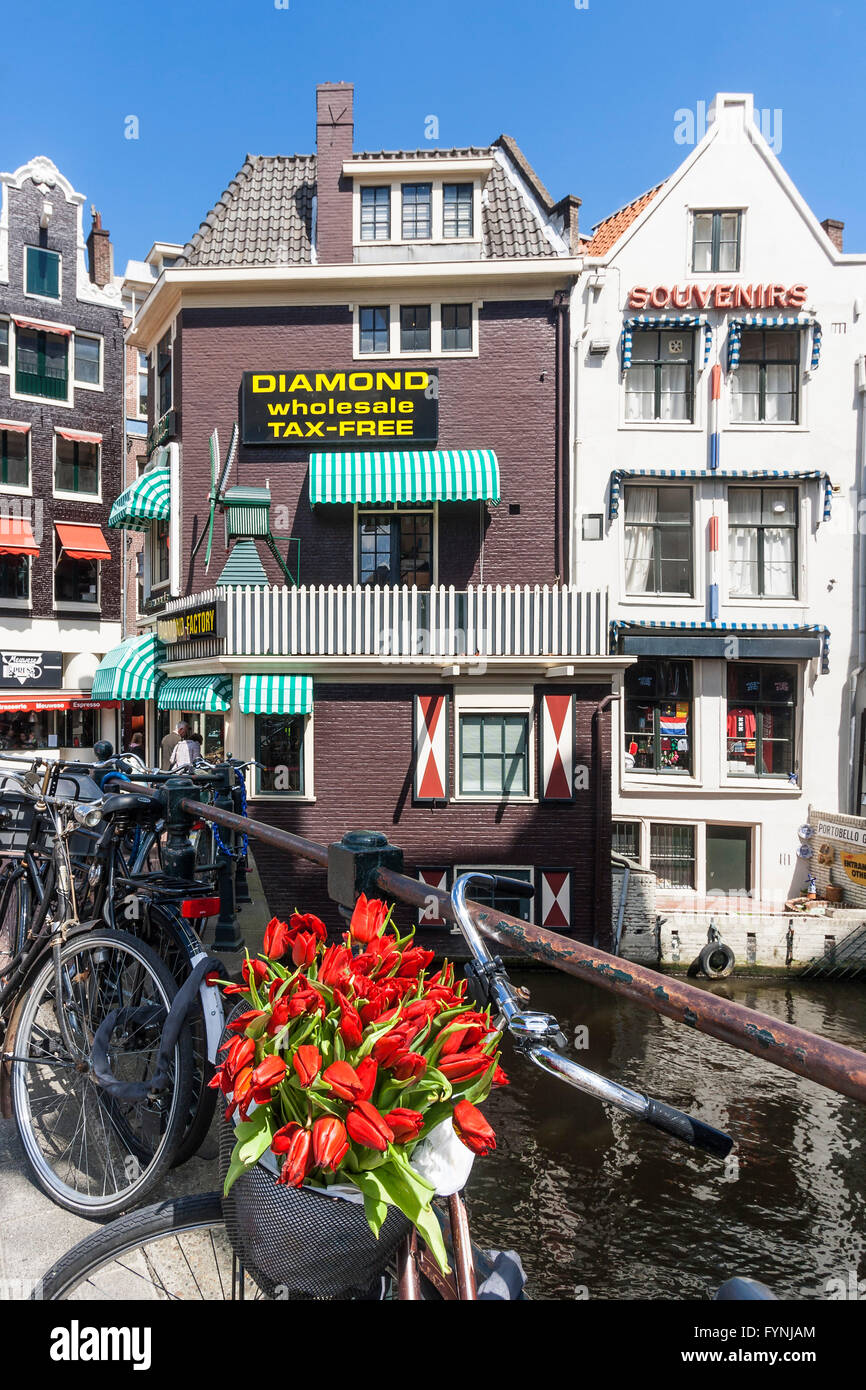 Amsterdam diamont factory , Grimnesssluis, bicycles, tulips,  Amsterdam, Netherlands Stock Photo