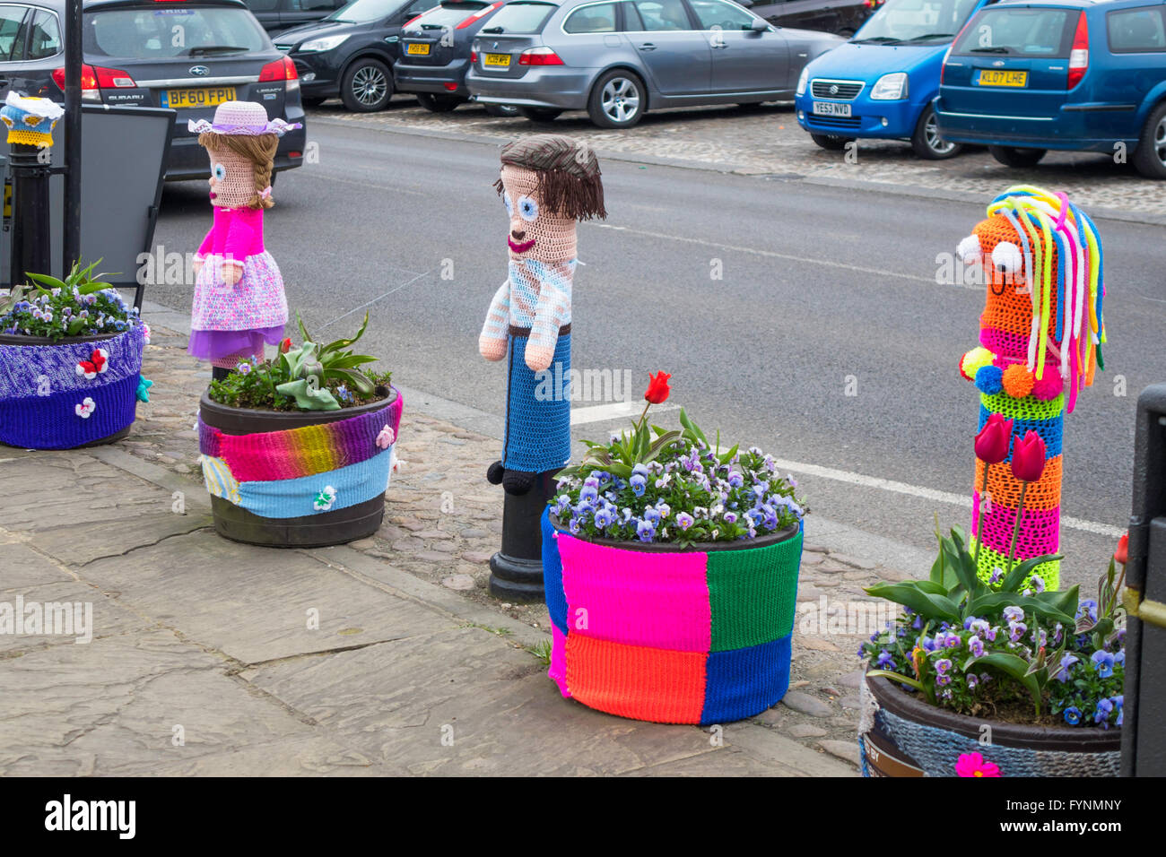 Yarn Bombing decorating public place with knitted objects here in