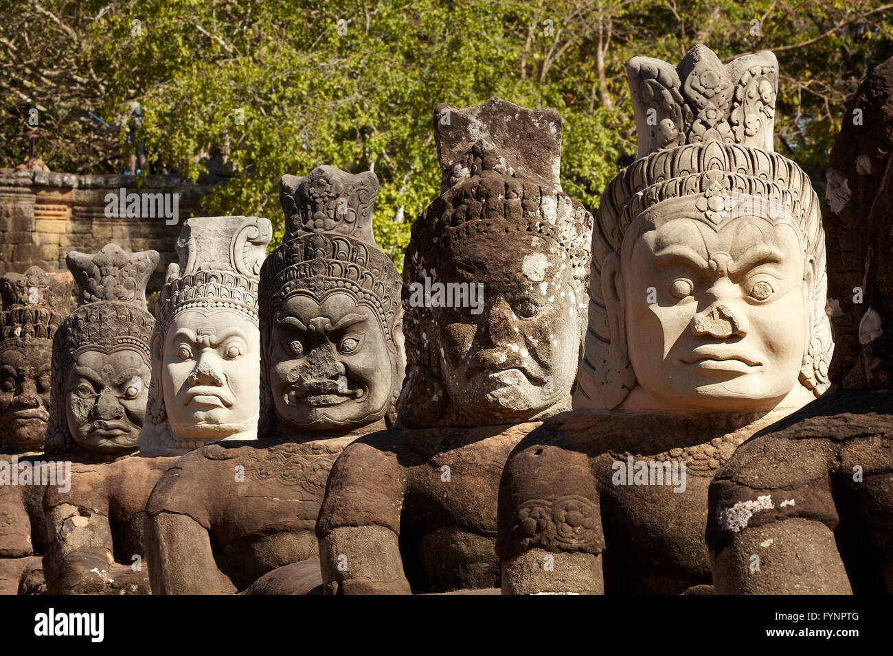 Statues of Asuras on South Gate Bridge, Angkor Thom (12th century ...