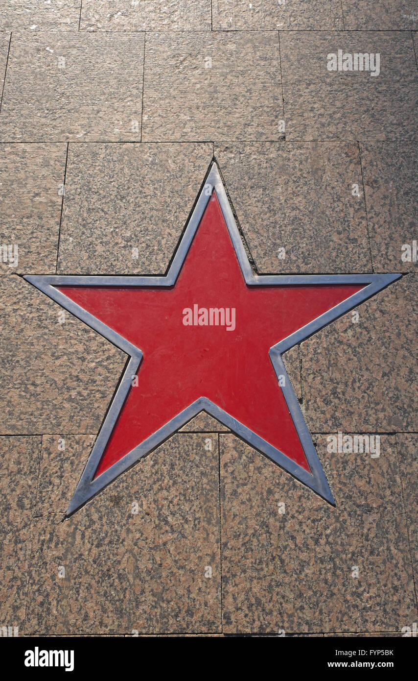 Russian red star set in the granite paving of the War Memorial, Yaroslavl, Russia. Stock Photo