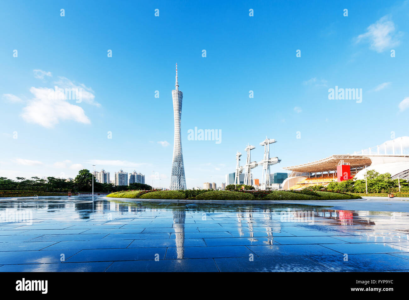 modern square and skyscrapers under blue sky Stock Photo - Alamy