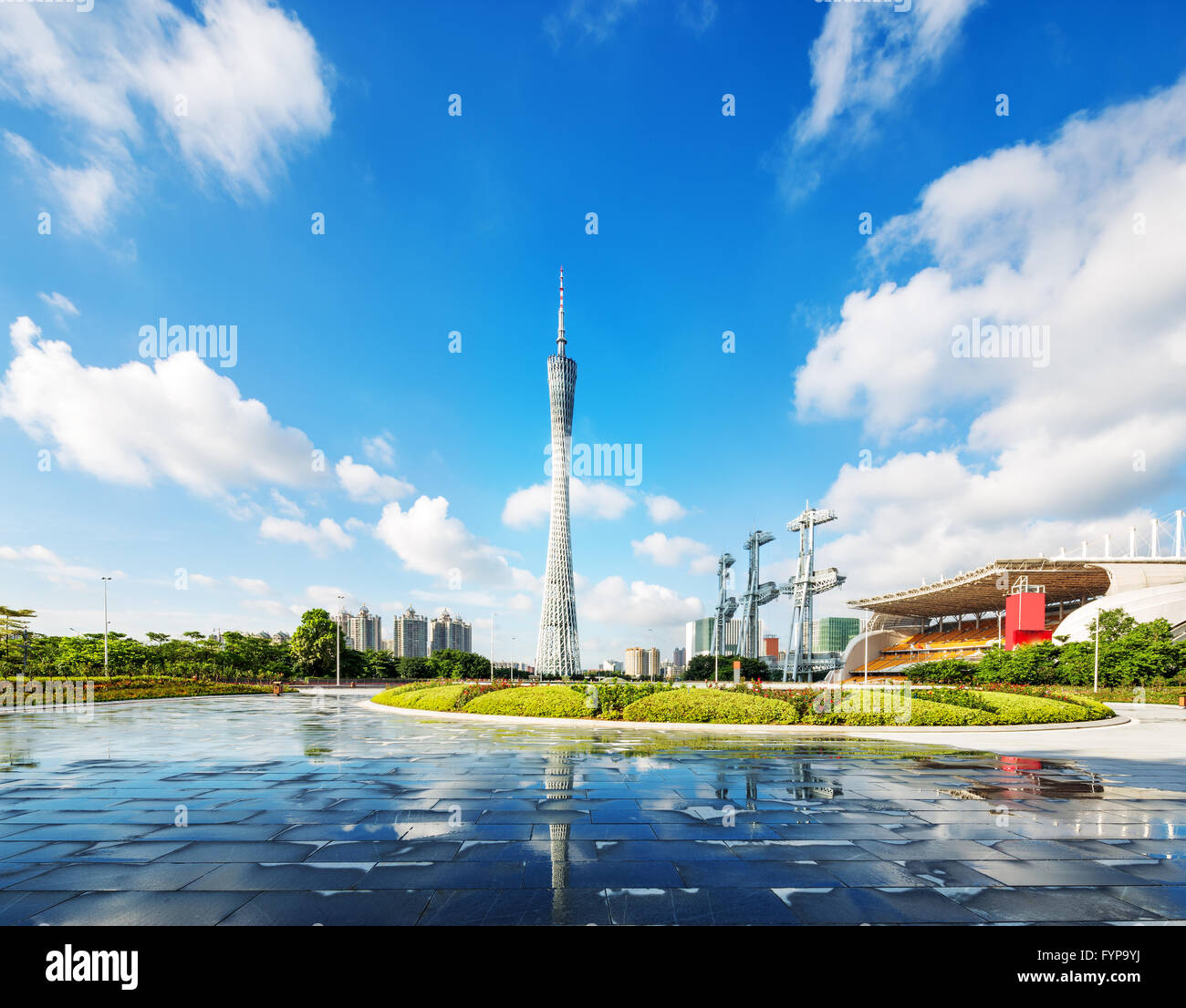 modern square and skyscrapers under blue sky Stock Photo - Alamy