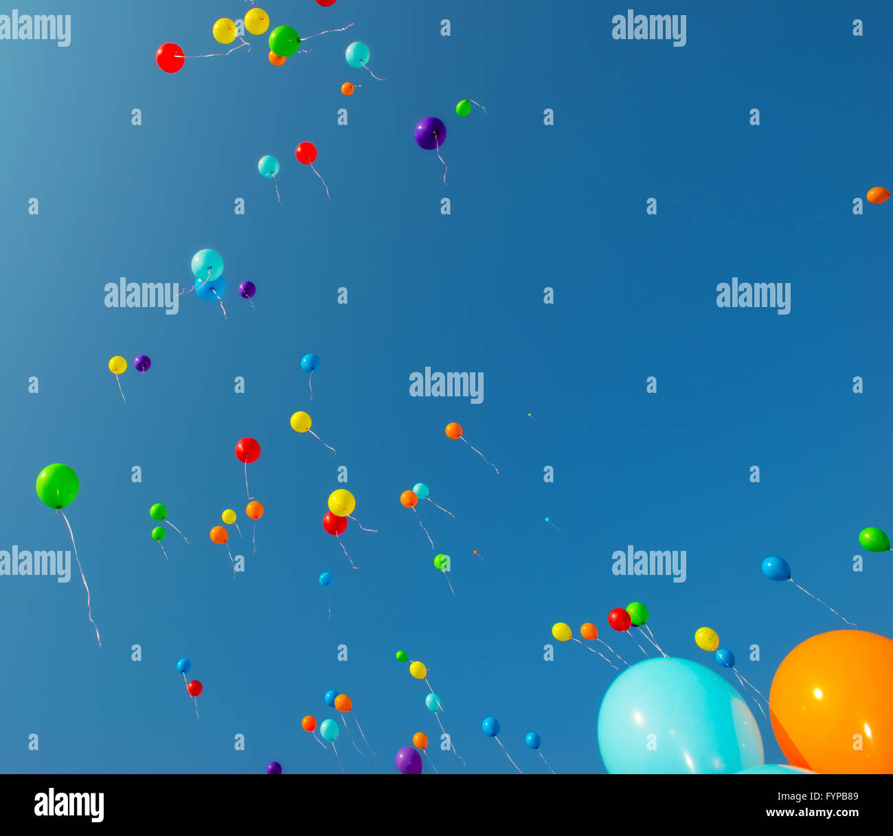 Flying color balloons Stock Photo - Alamy