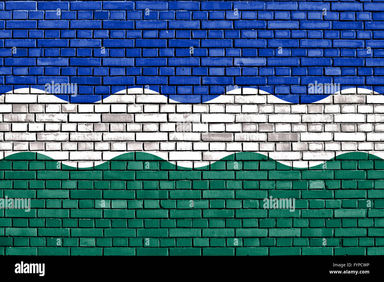 flag of Nederweert painted on brick wall Stock Photo