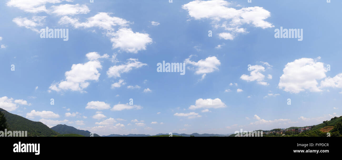 mountains under clear, blue sky and white cloud Stock Photo - Alamy