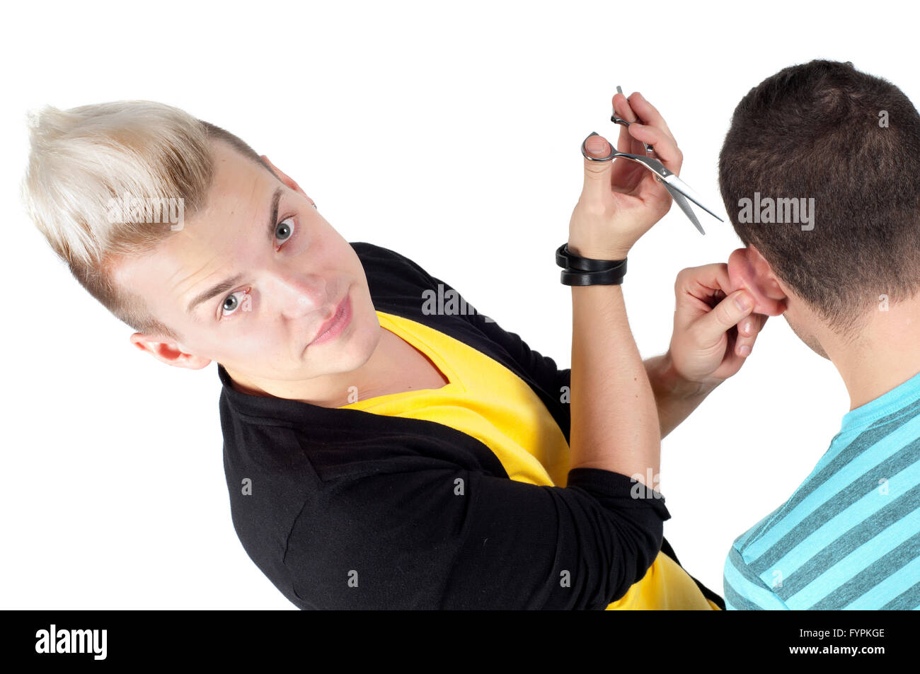 Hairdresser working with scissors Stock Photo