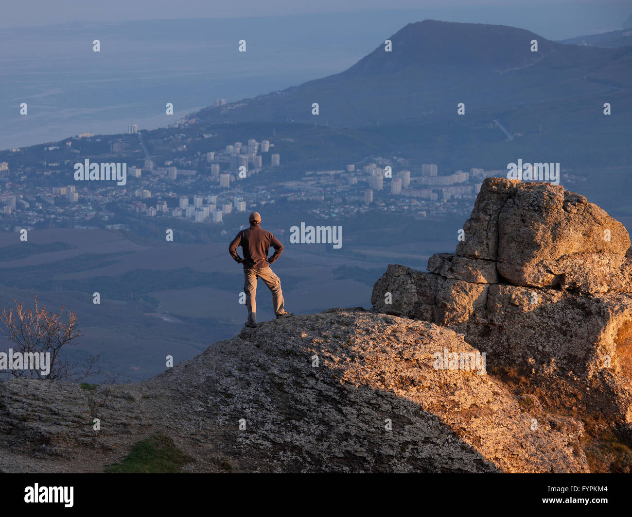Person on mountain top hi-res stock photography and images - Alamy