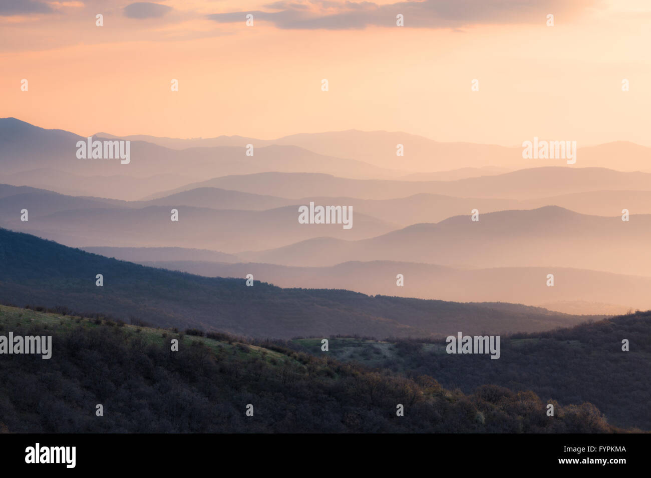 Mountains silhoutte at sunrise Stock Photo