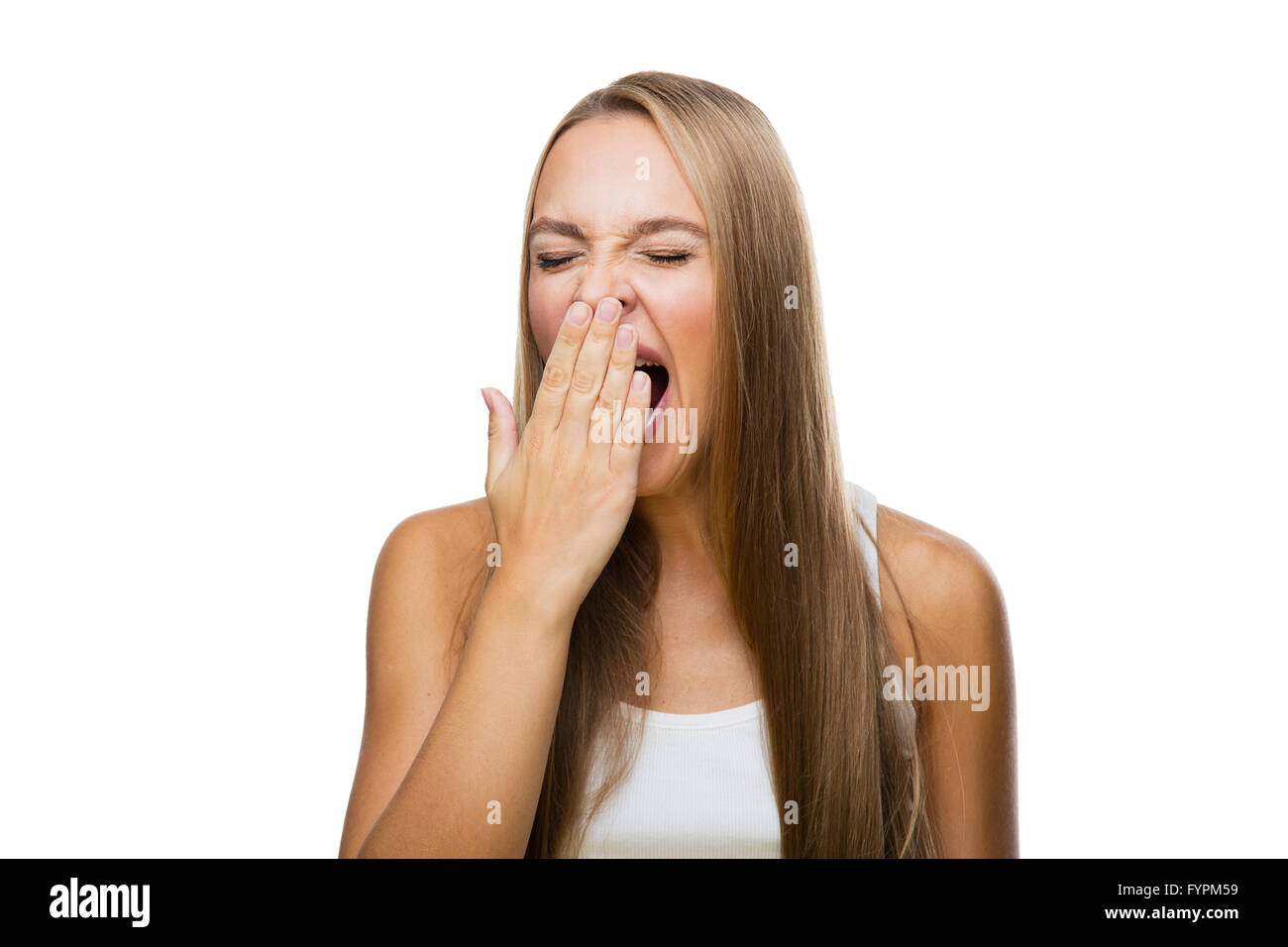 Woman yawns of boredom on white background Stock Photo