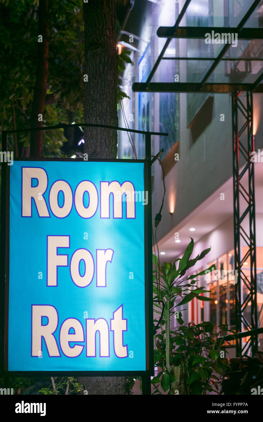 illuminated signboard room for rent Stock Photo