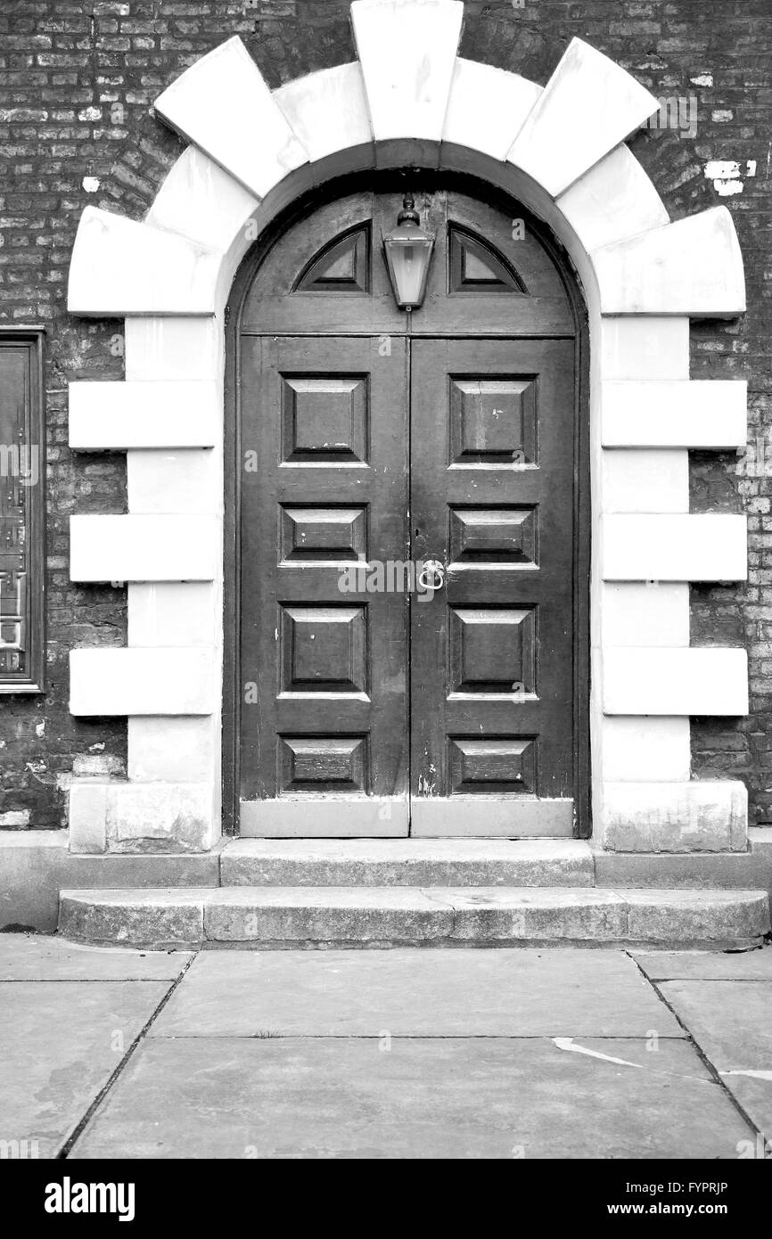 wooden parliament in london old church door and marble antique  wall Stock Photo