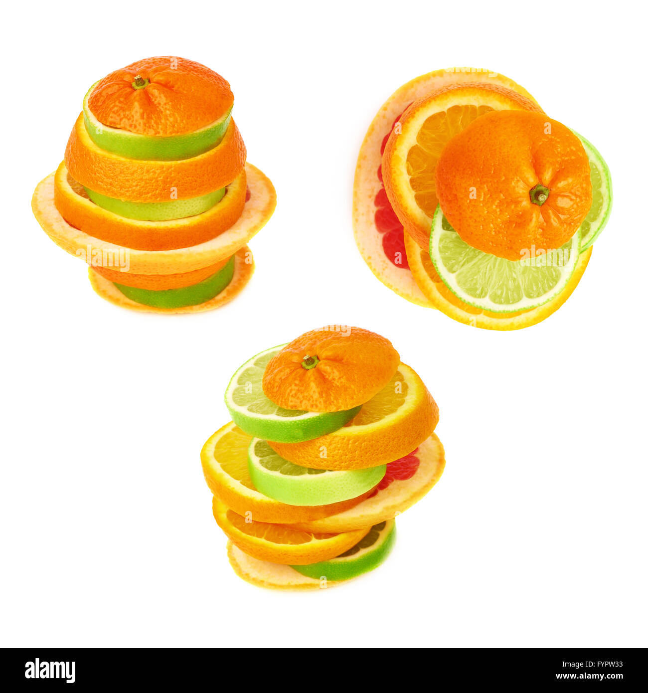 Stack of citrus sliced fruits over white isolated background Stock