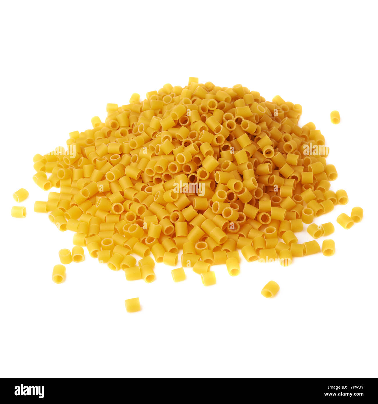 Pile of dry ditalini pasta over isolated white background Stock Photo
