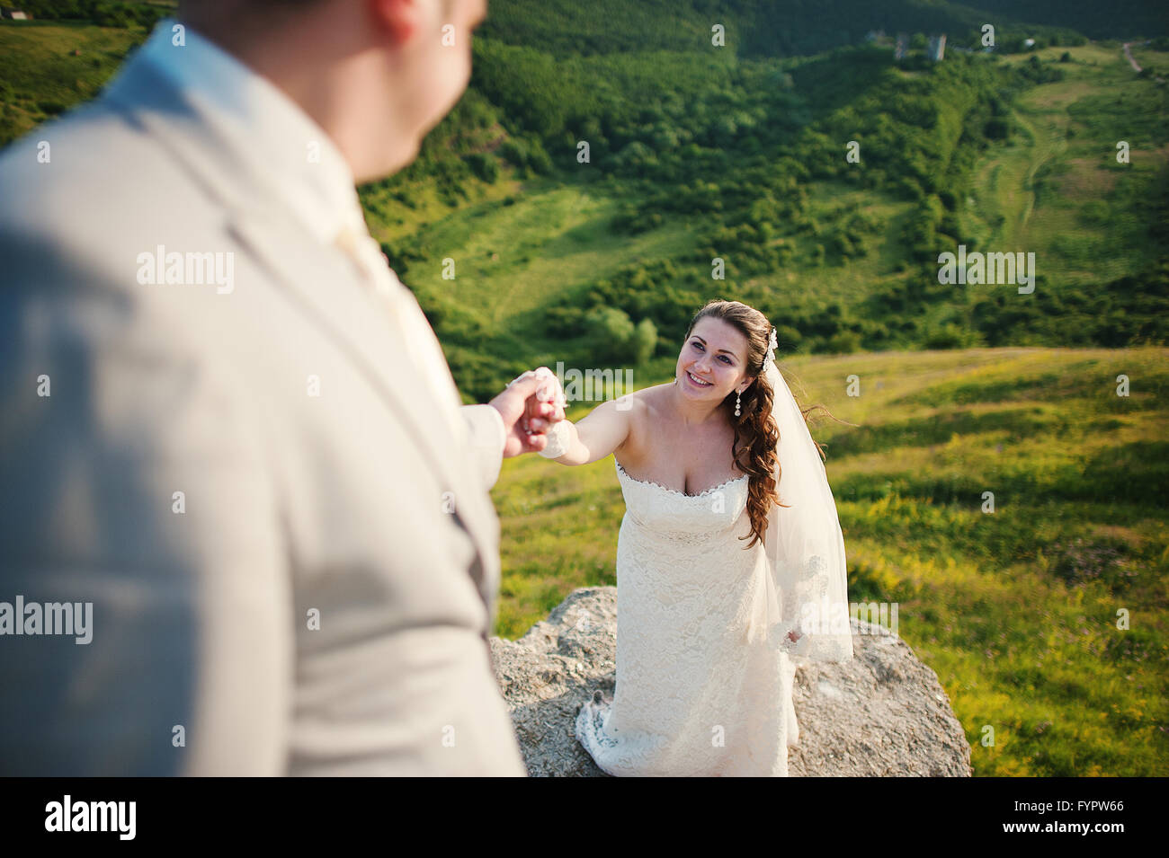 Marriage On Rocks Wedding couple on rock hi-res stock photography and images - Alamy