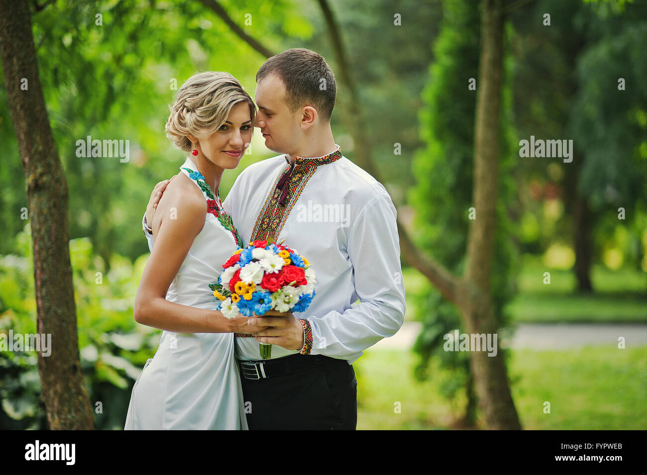 Wedding beautiful couple in traditional dress Stock Photo