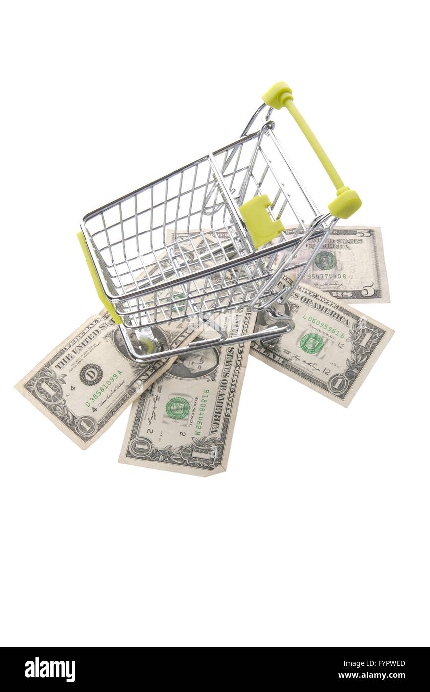 Dollars and grocery cart. Stock Photo