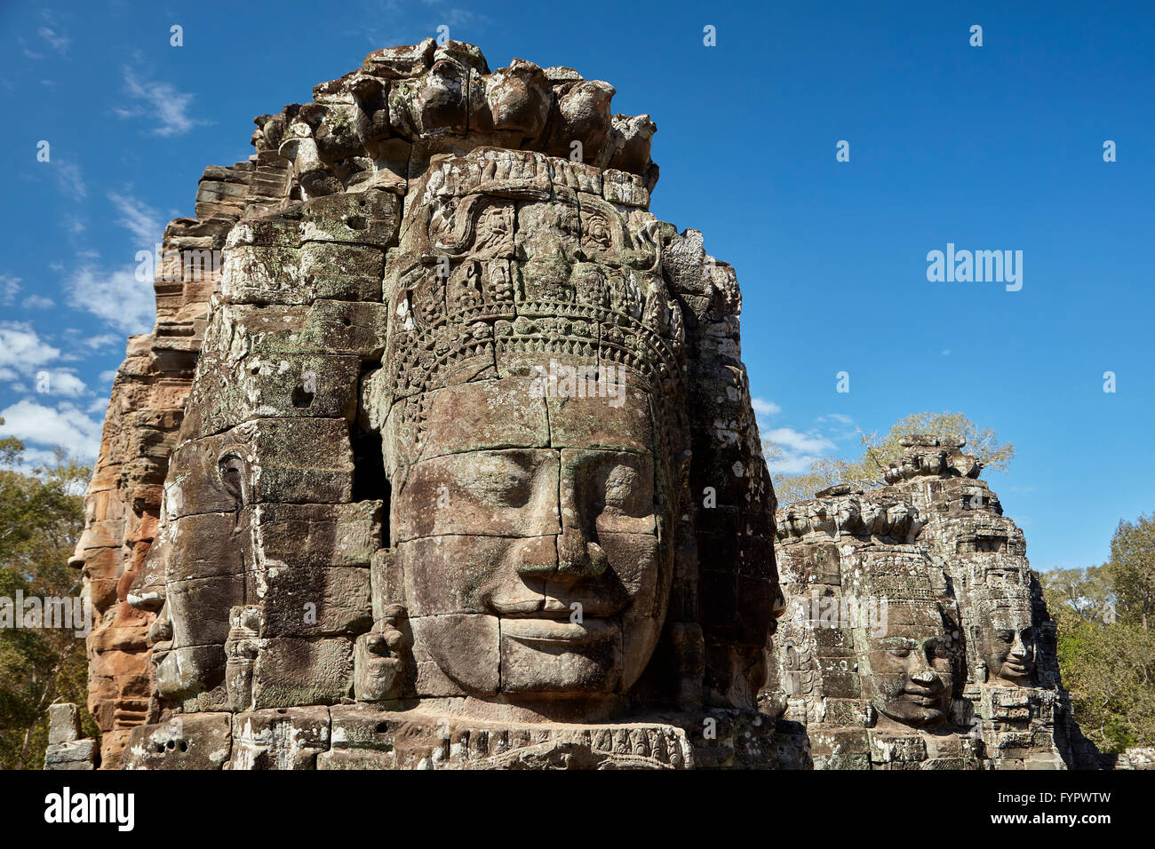 Faces, Bayon temple ruins, Angkor Thom (12th century temple complex), Angkor World Heritage Site, Siem Reap, Cambodia Stock Photo