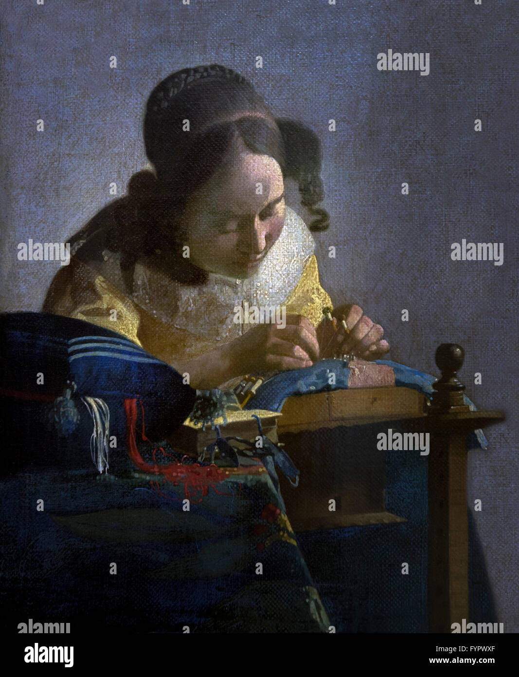 The Lacemaker, La Dentelliere,  by Johannes Vermeer, circa 1669, Musee du Louvre, Paris France, Europe Stock Photo