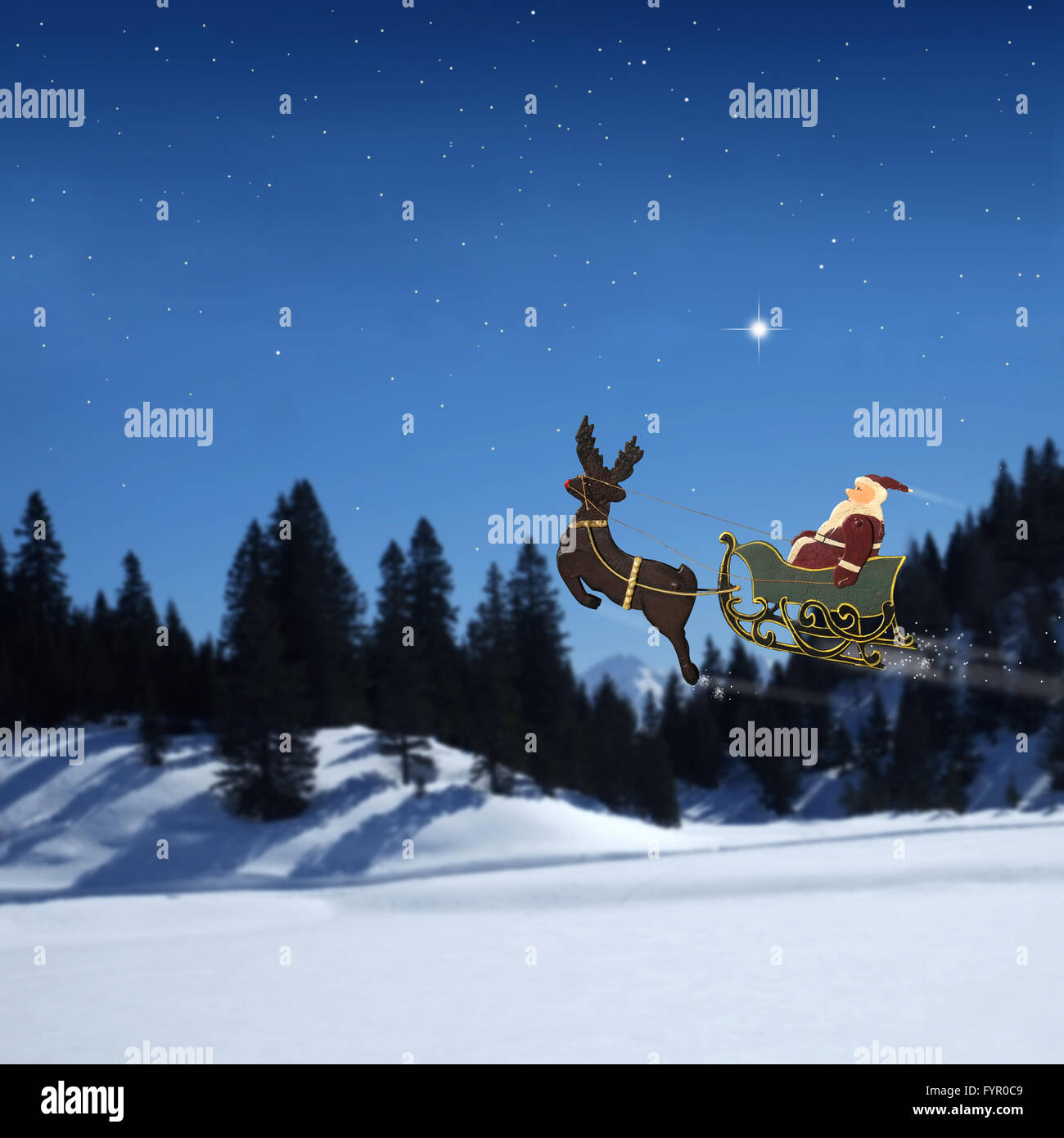 Santa Claus with reindeer Stock Photo