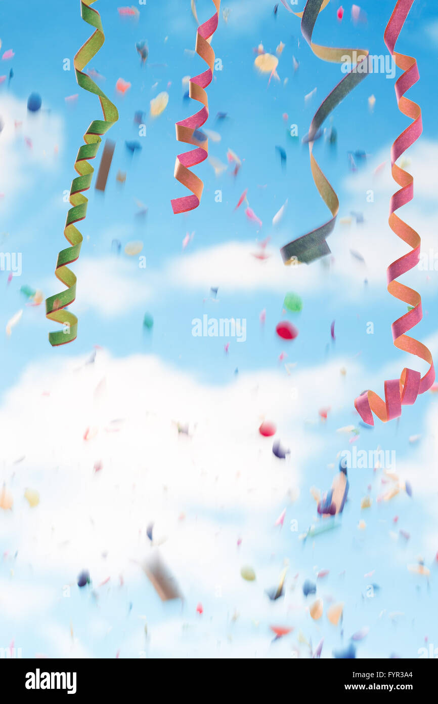 Streamers and confetti white and blue background Stock Photo - Alamy