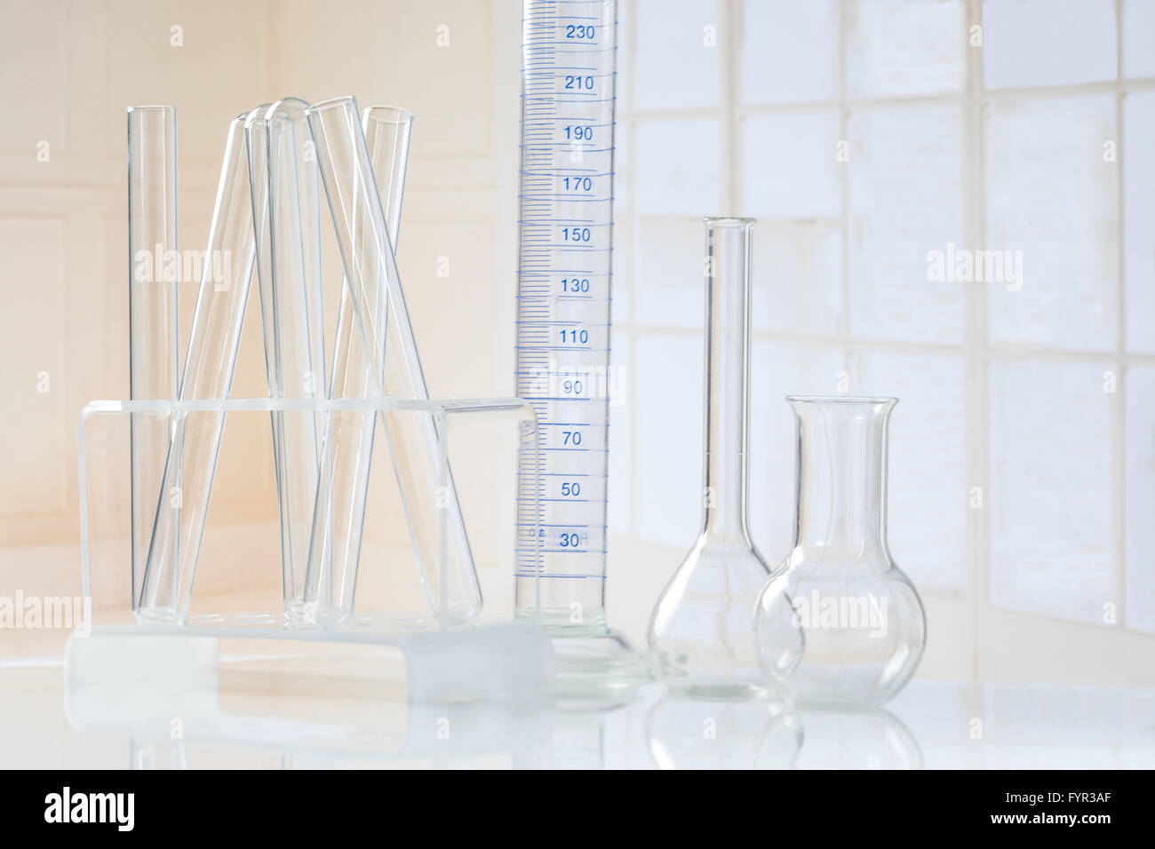 Laboratory glassware Testtubes and several glass object Stock Photo