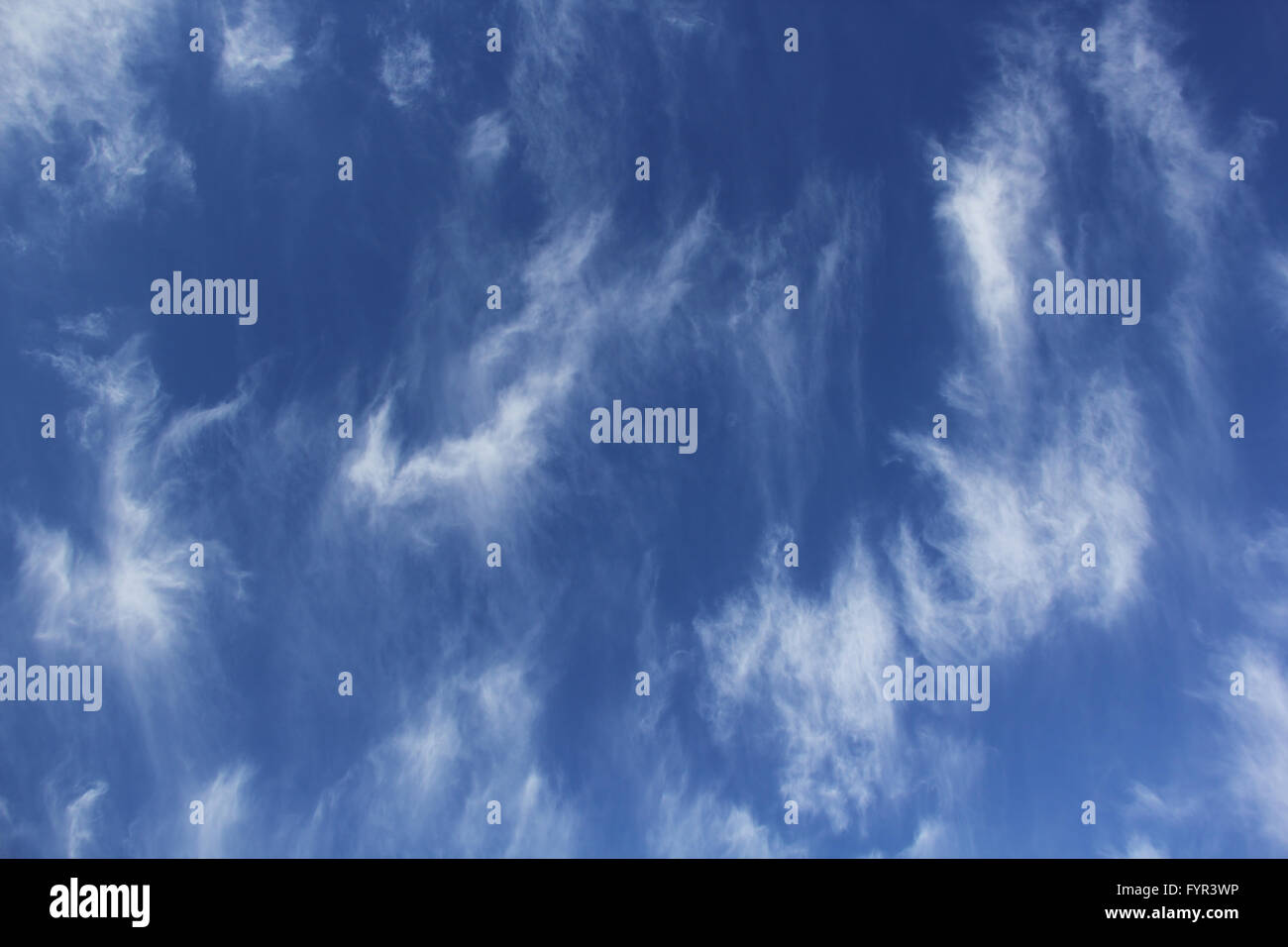Cloudscape of cirrus uncinus clouds in blue sky Stock Photo