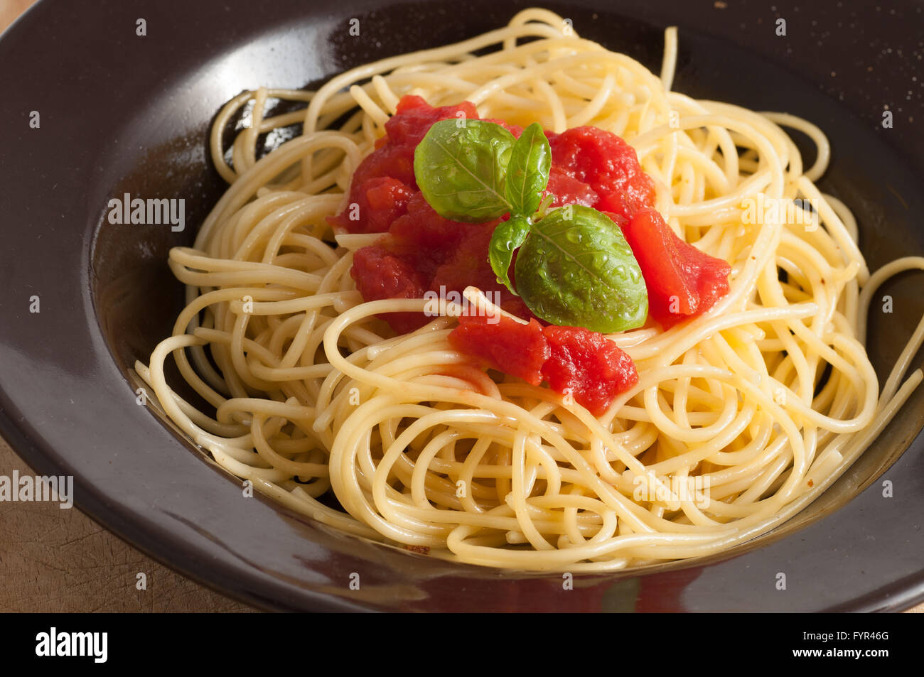 spaghetti with fresh tomato and basil Stock Photo