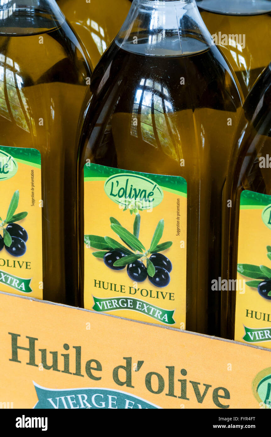 Bottles of L'olivaé extra virgin olive oil for sale in France. Stock Photo