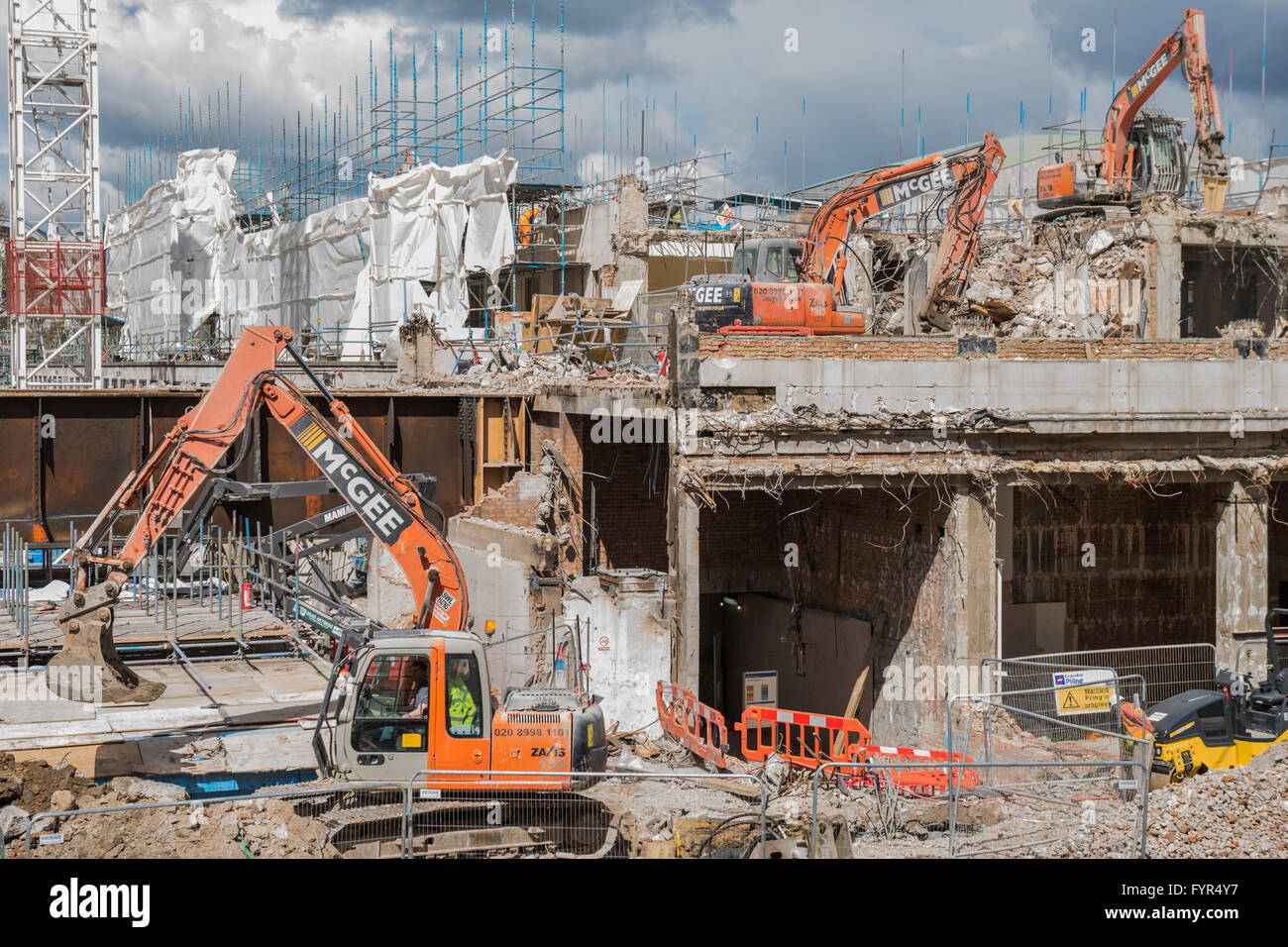 Diggers from the McGee Group get stuck into the demolition of the Shell Centre at Waterloo, London Stock Photo