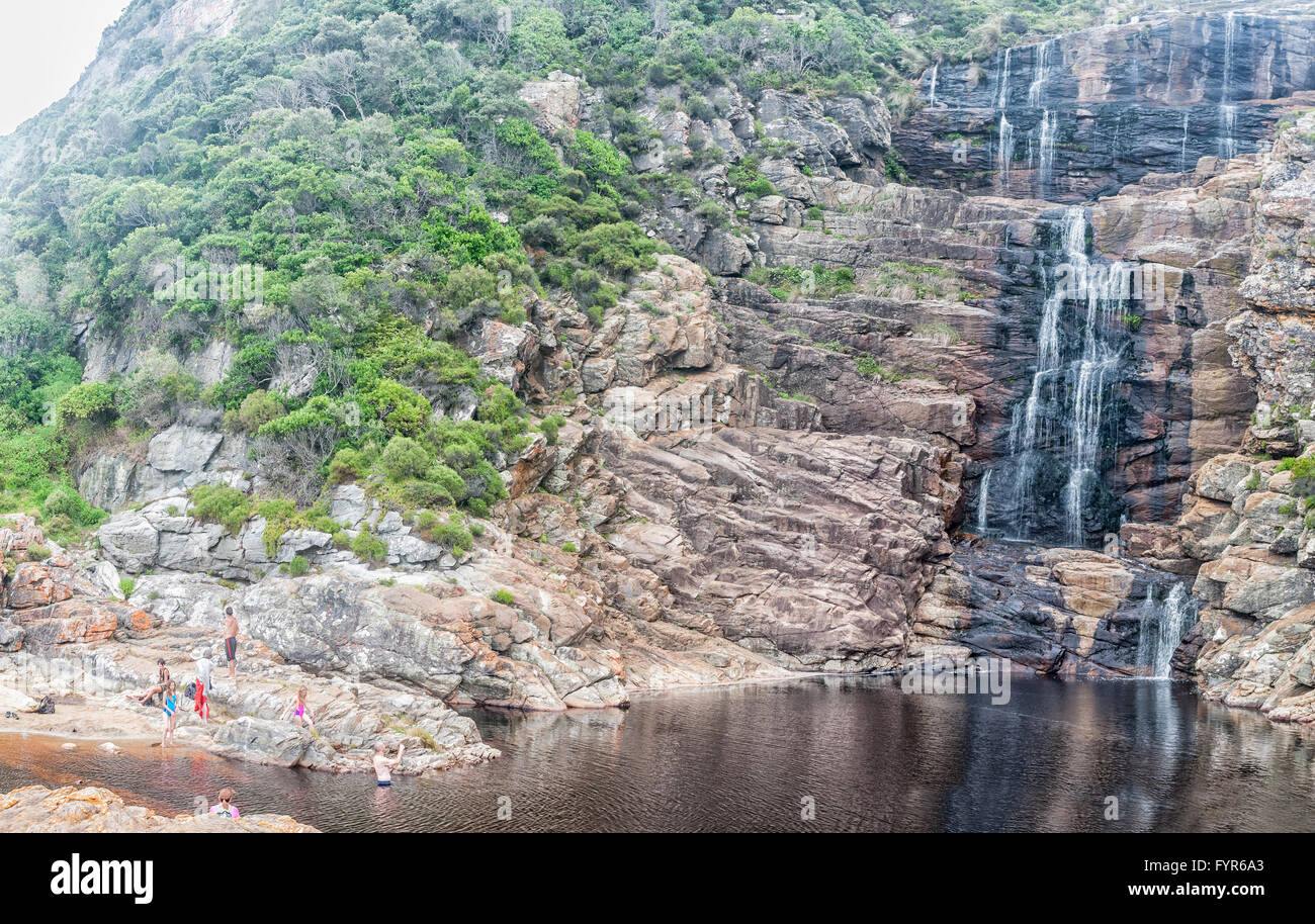 STORMS RIVER MOUTH, SOUTH AFRICA - MARCH 1, 2016:  Unidentified tourists at the pool below the waterfall Stock Photo