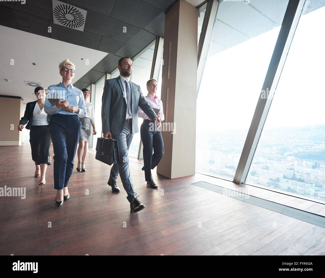 business people group walking Stock Photo - Alamy