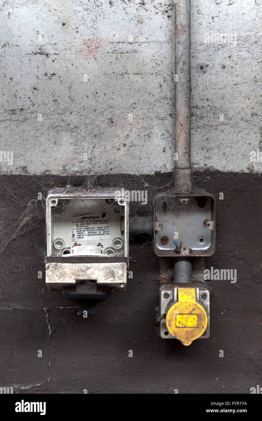 electrical switch boxes in a derelict building Stock Photo Alamy