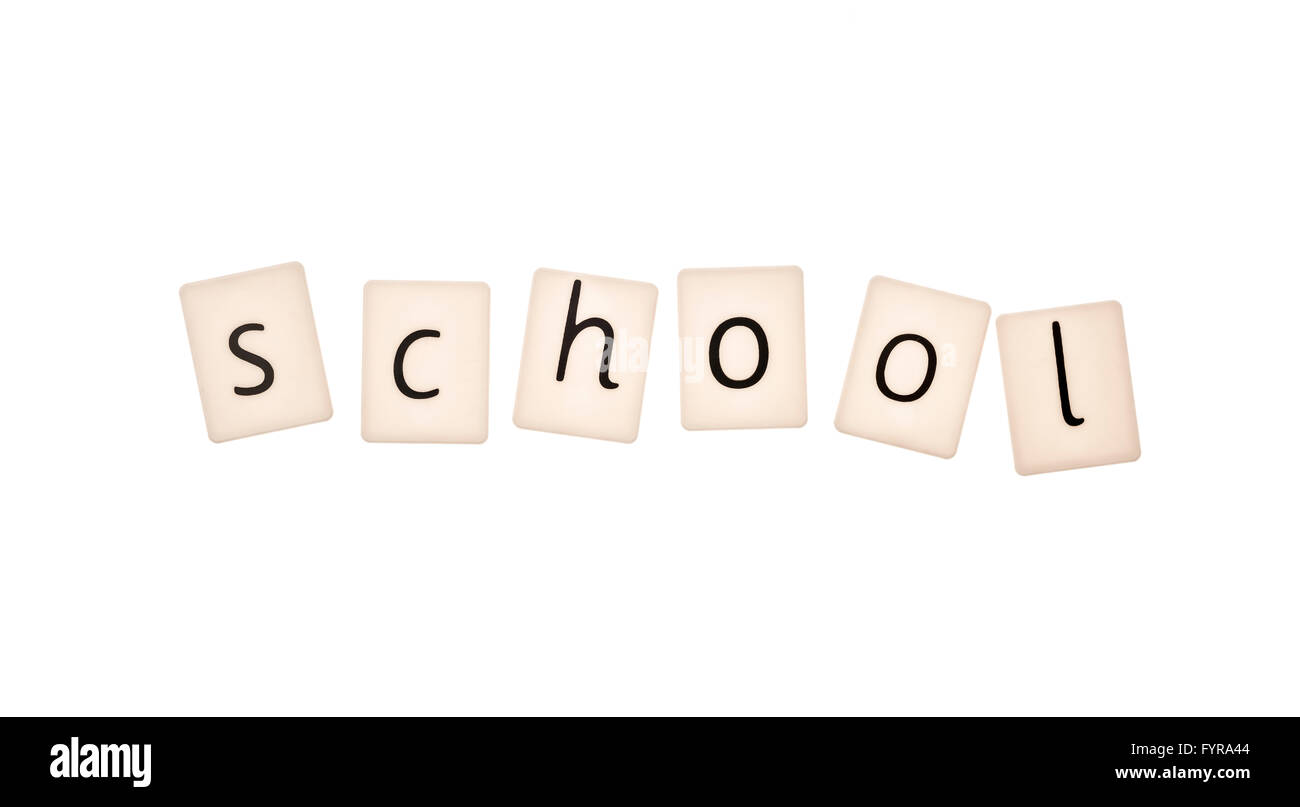 Plastic letters on white background spelling the word school Stock Photo