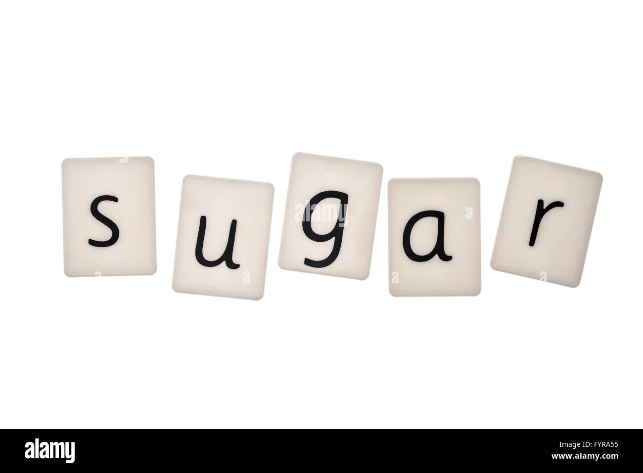 Plastic letters on white background spelling the word sugar Stock Photo