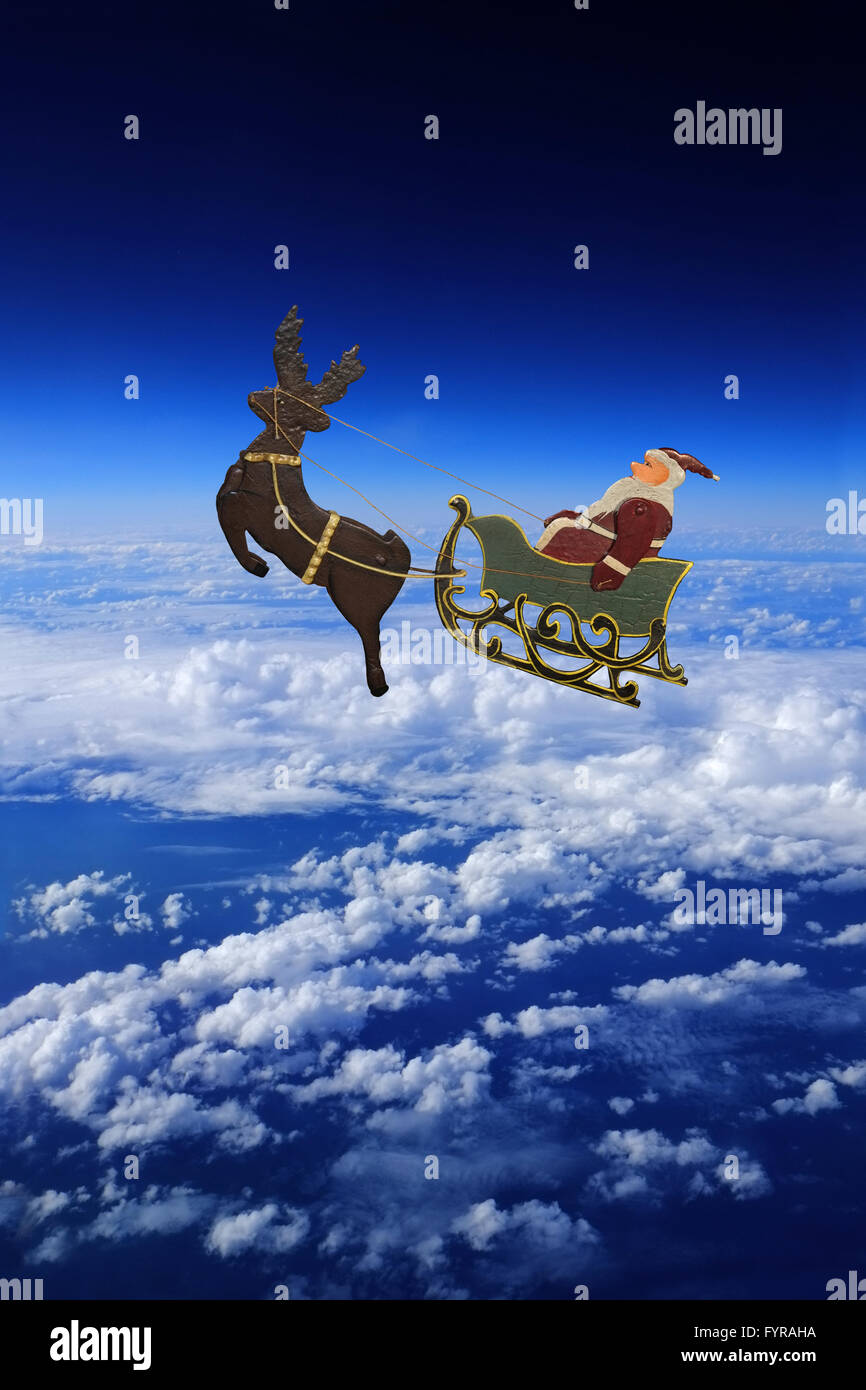 Santa Claus sitting in the reindeer sled Stock Photo