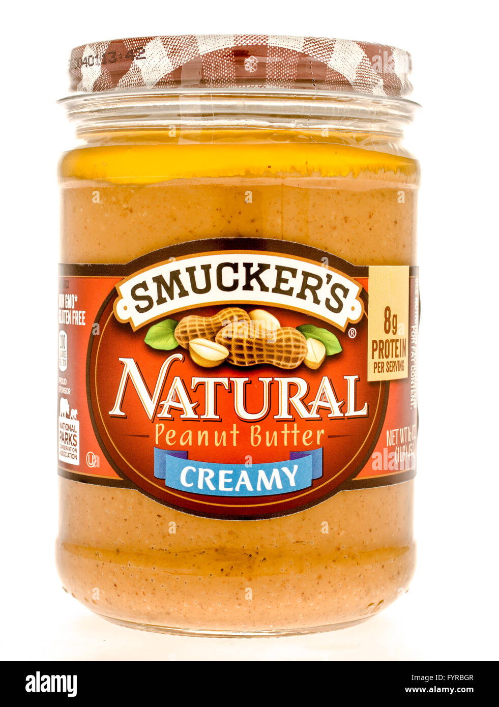 Winneconne, WI - 27 Sept 2015:  Jar of Smuckers natural peaunt butter that is creamy. Stock Photo