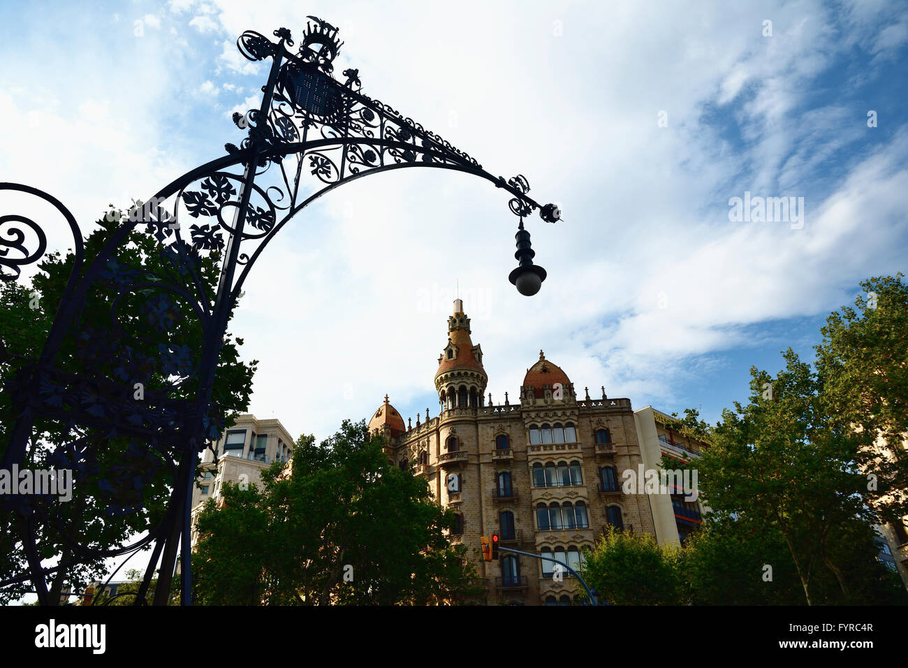 Bancs-Fanals, lampposts-benches, located along the Paseo de Gracia in Barcelona and Cases Antoni Rocamora. Barcelona, Catalonia, Stock Photo