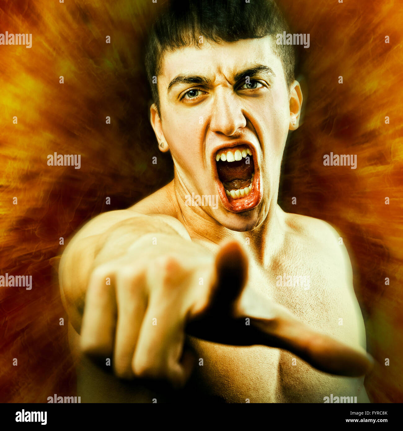 Angry Furious Man Screaming and Pointing Finger Stock Photo