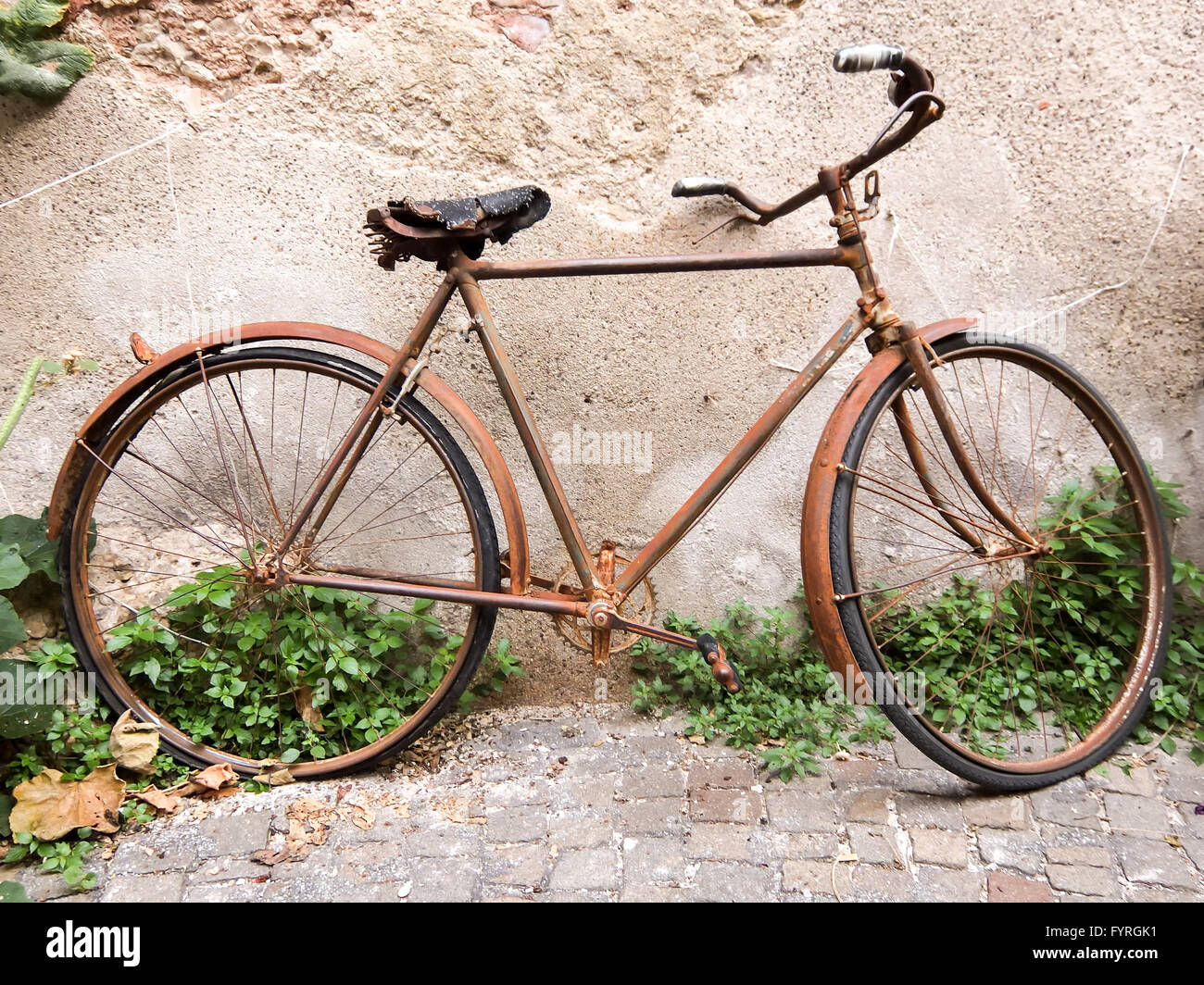 Old rusty vintage bicycle Stock Photo