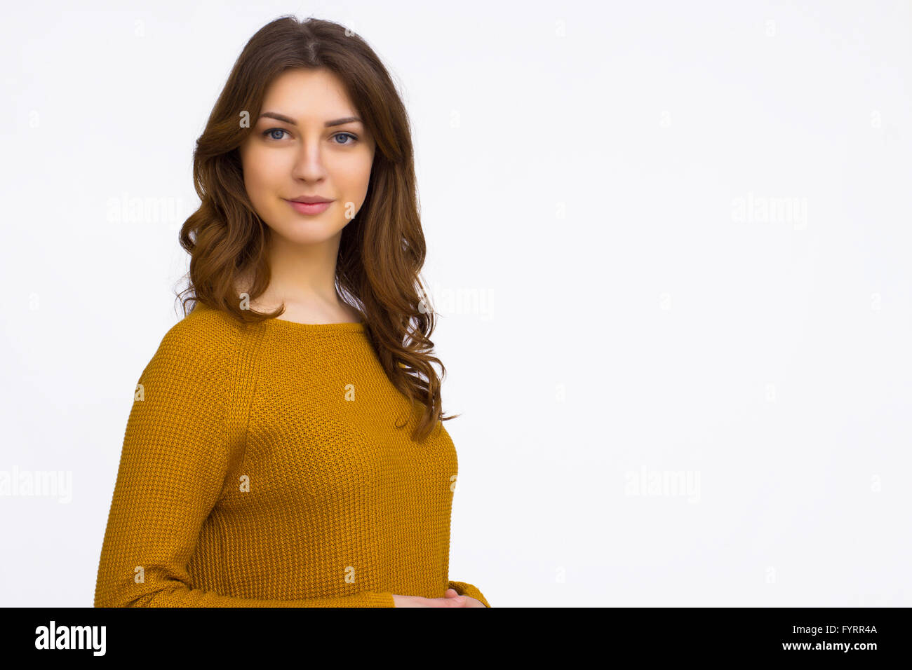 Pretty girl in orange sweater Stock Photo Alamy
