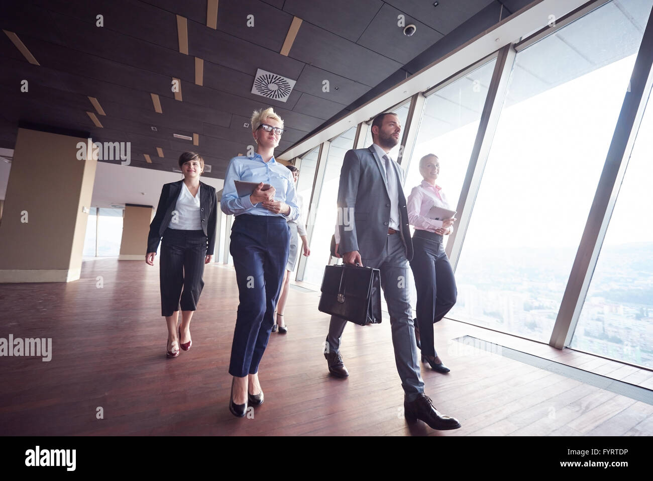 business people group walking Stock Photo - Alamy