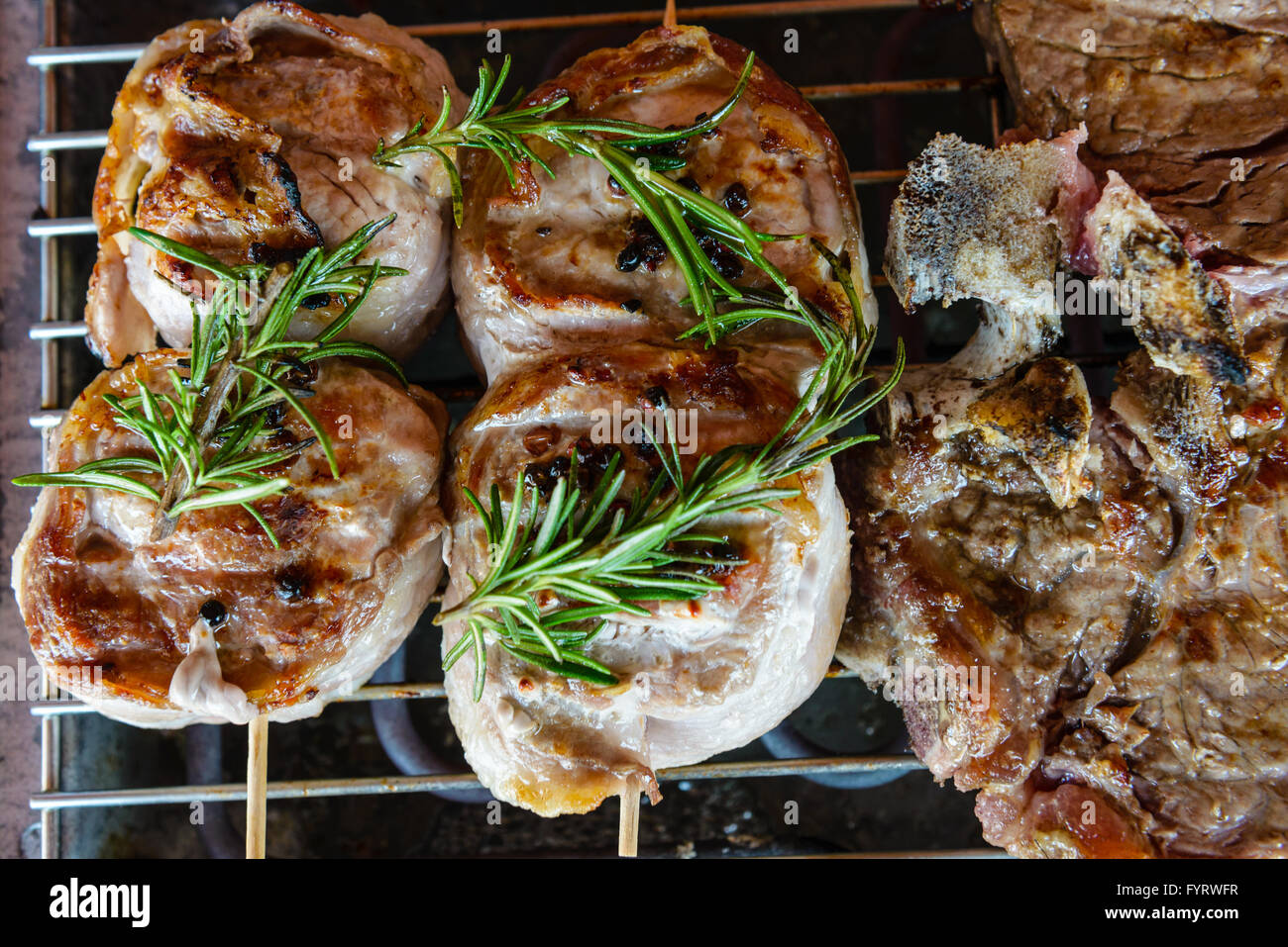 Barbecued meat seasoned with olive oil Stock Photo Alamy
